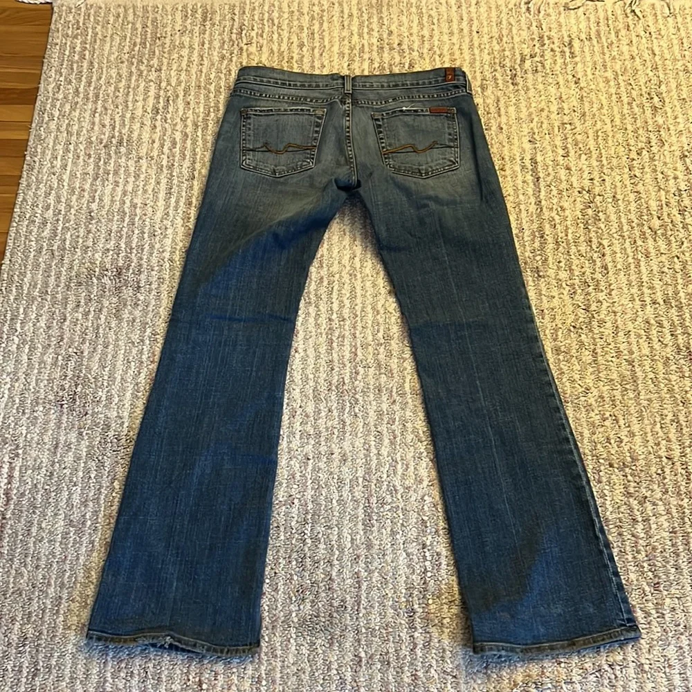 7 For All Mankind Blue Boot Cut Jeans with Vintage Fading - Picture 4 of 6